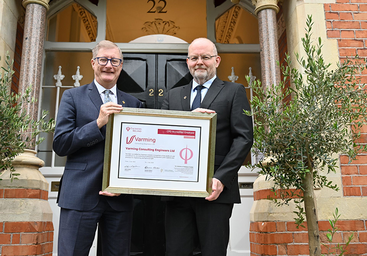 James Kavanagh of Varming Consulting Engineers receiving CPD Employer Standard parchment from Engineers Ireland’s Damien Owens outside the Engineers Ireland offices.
