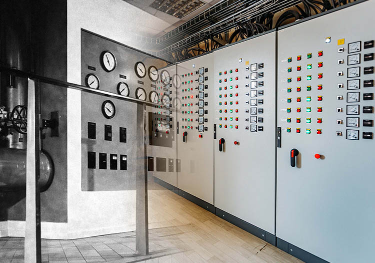 Evolution of electrical engineering systems from historical control panels to modern switchgear and building services monitoring technology